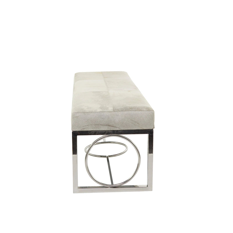 Banc en cuir de vache avec base argentée à découpes géométriques beige